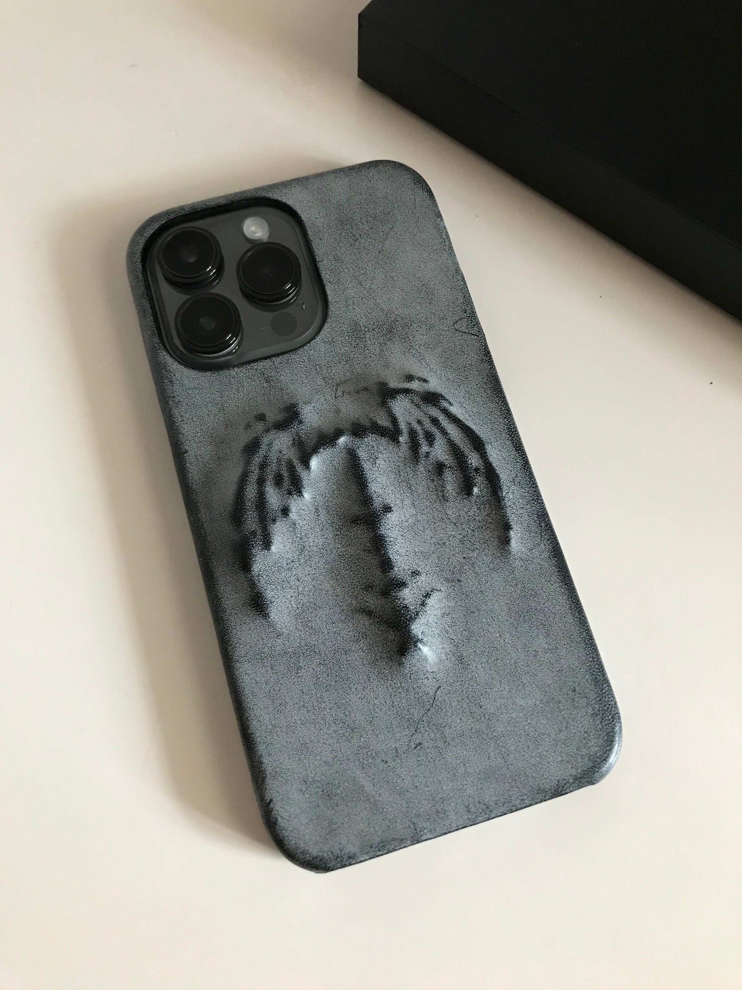 (Half-covered)Vampire bat relief