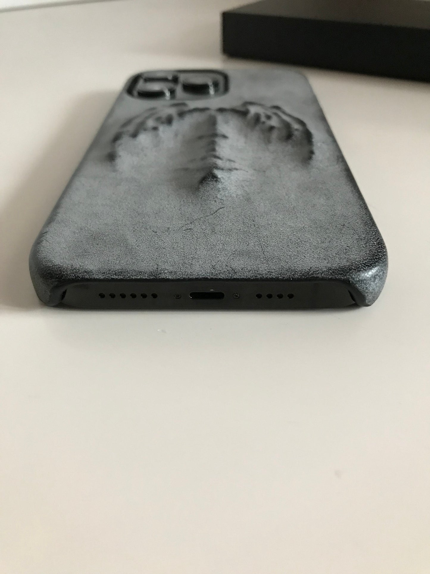 (Half-covered)Vampire bat relief