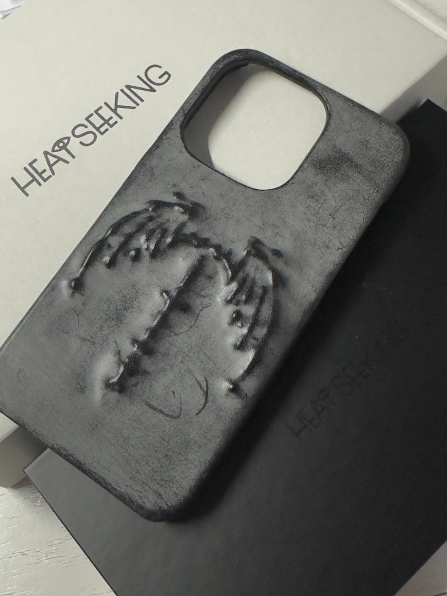 (Half-covered)Vampire bat relief