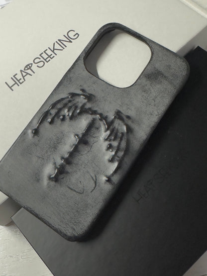 (Half-covered)Vampire bat relief